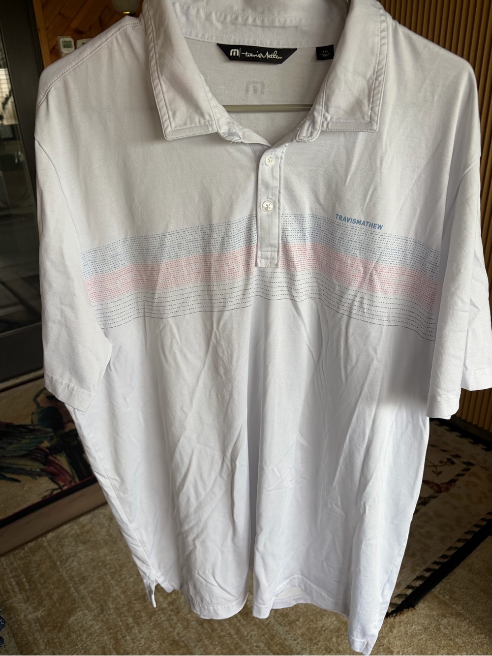Travis Mathew Men’s White Polo Shirt with Subtle Stripe